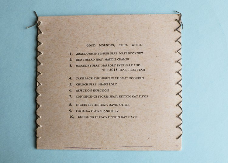 good morning cruel world back and tracklist.png